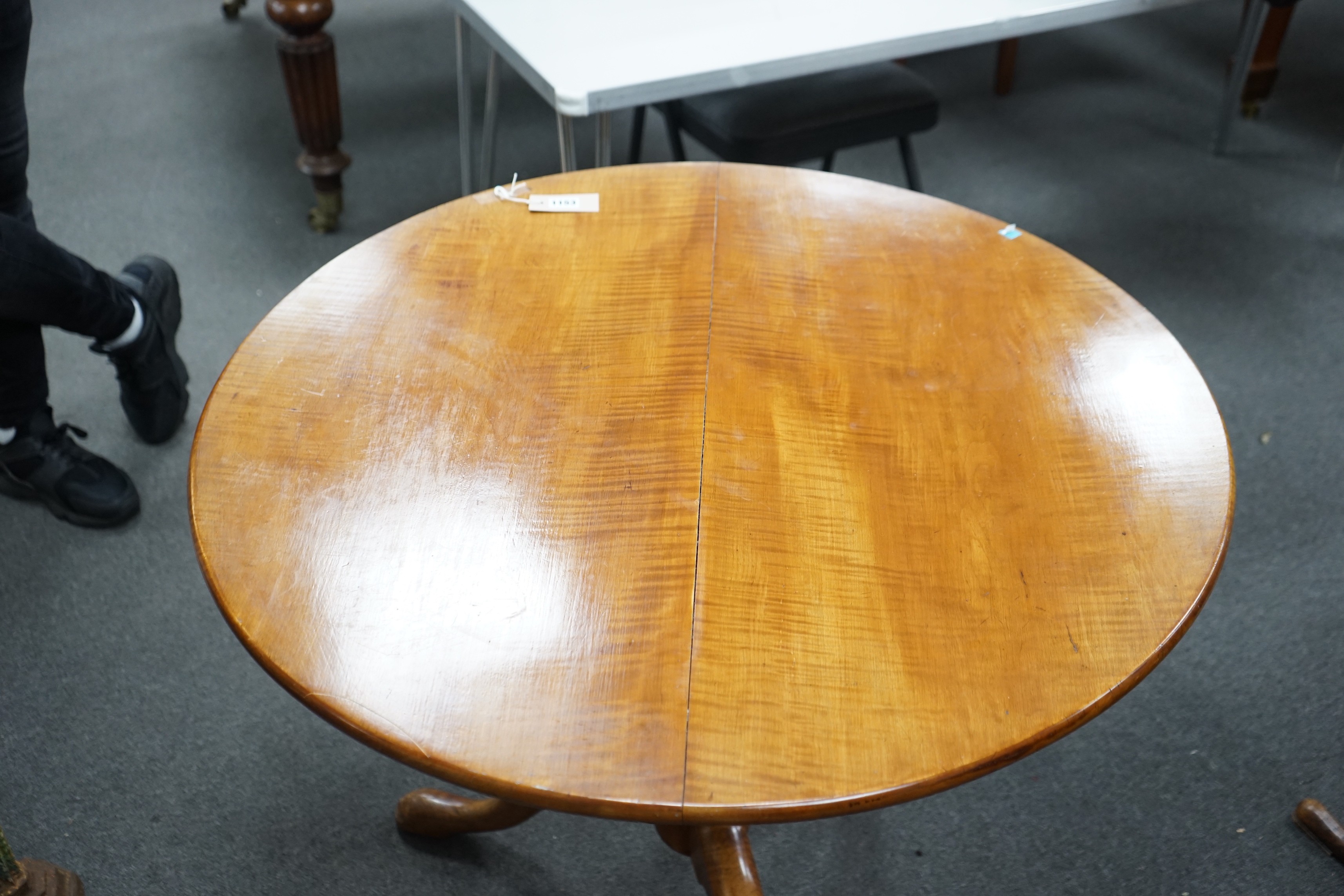 A Victorian circular satin birch tilt top tea table with bird cage action, diameter 84cm, height 70cm